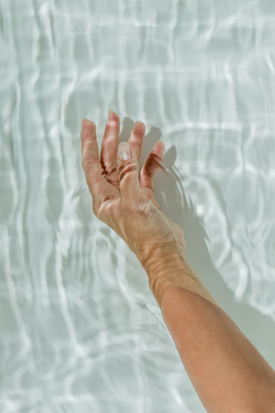 Hand in water